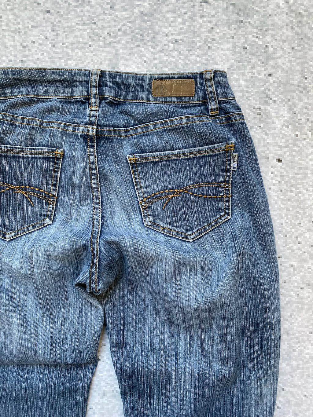Multiblu low waisted and flared jeans