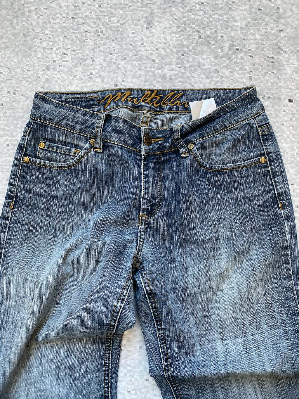 Multiblu low waisted and flared jeans