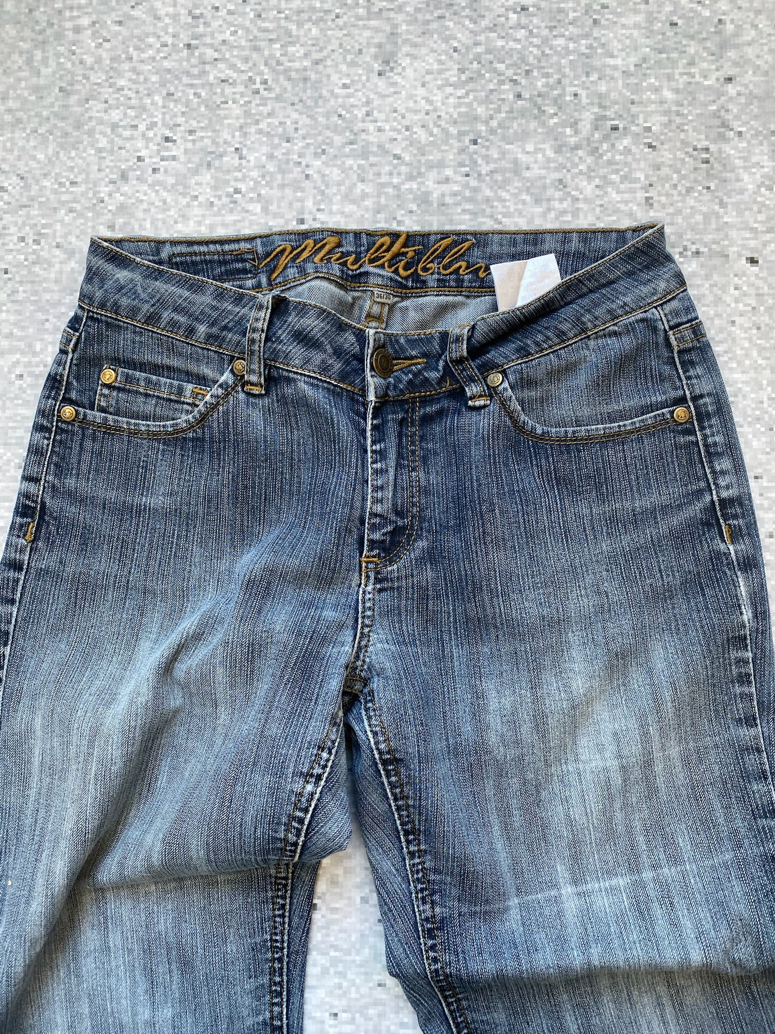 Multiblu low waisted and flared jeans