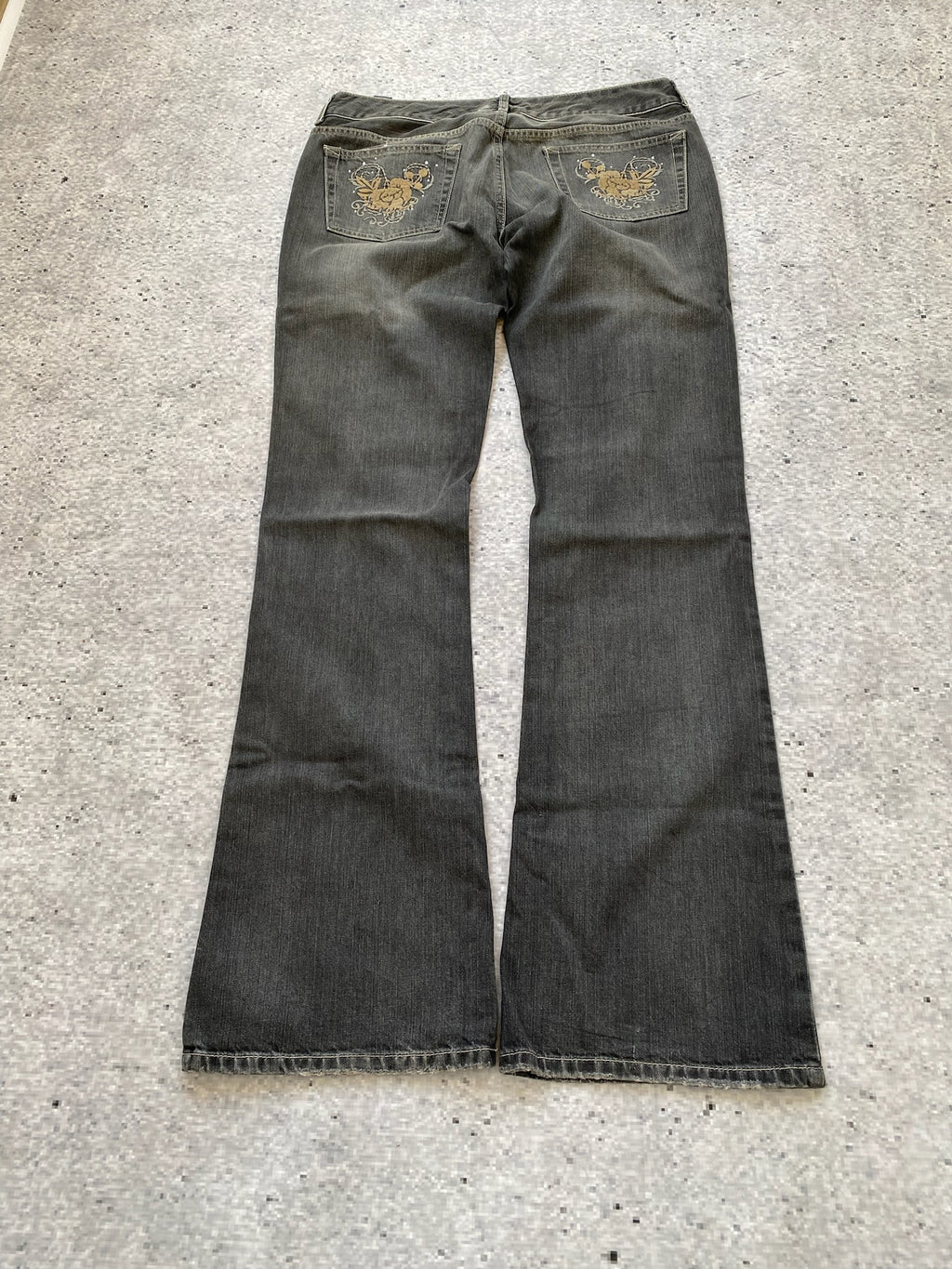 Flared and Low Waisted Jeans with flower pocket detail
