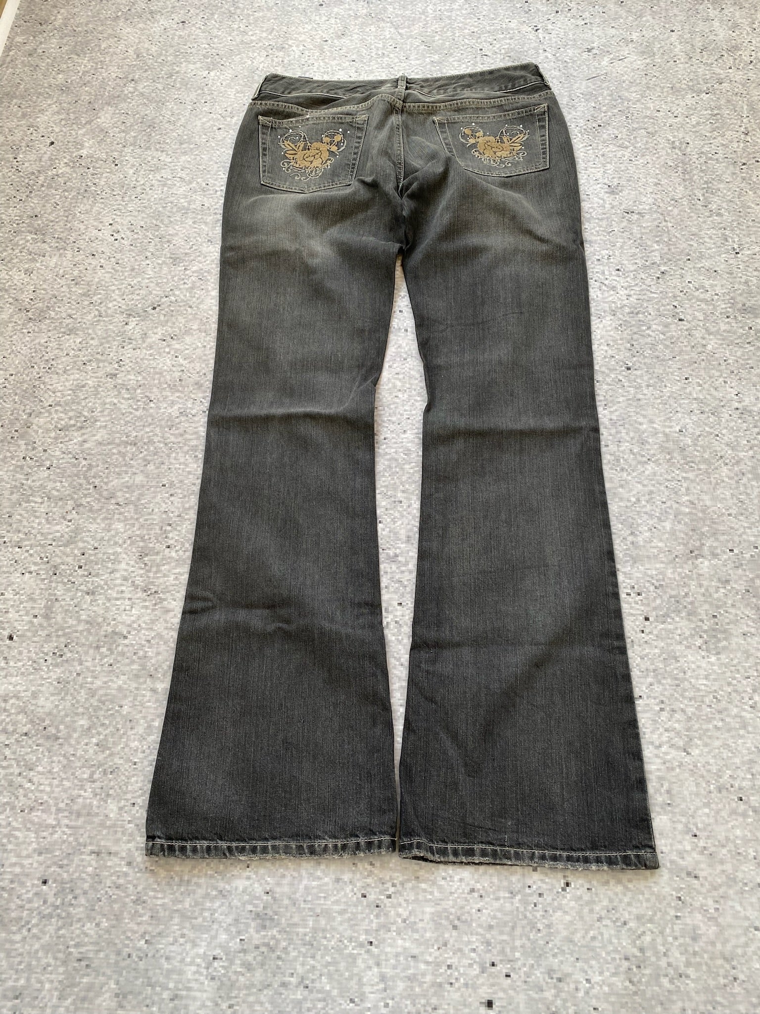 Flared and Low Waisted Jeans with flower pocket detail