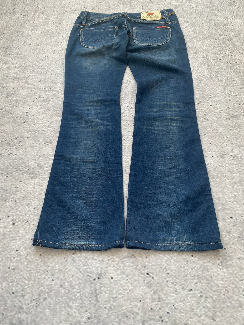 Indian Rose Ultra Low Waisted Flared 2000s jeans