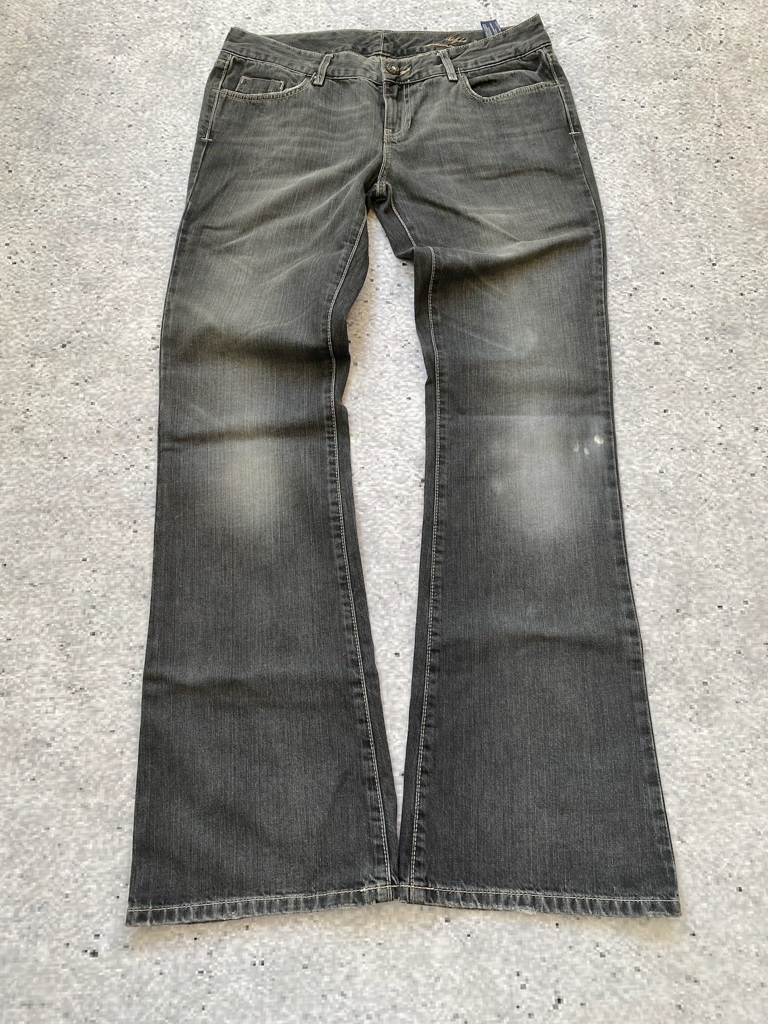 Flared and Low Waisted Jeans with flower pocket detail