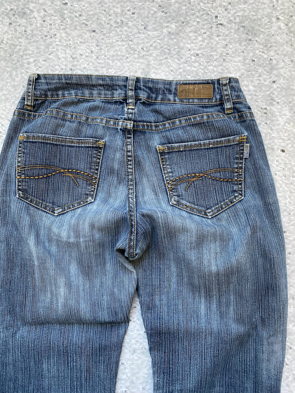 Multiblu low waisted and flared jeans