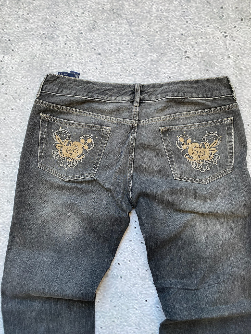 Flared and Low Waisted Jeans with flower pocket detail