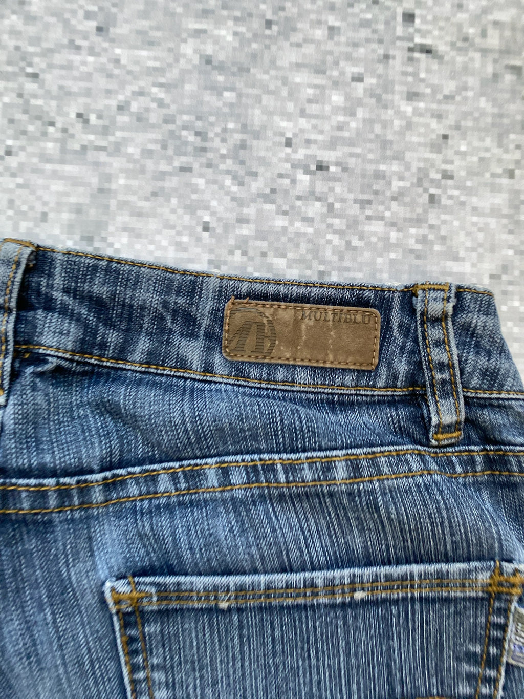 Multiblu low waisted and flared jeans