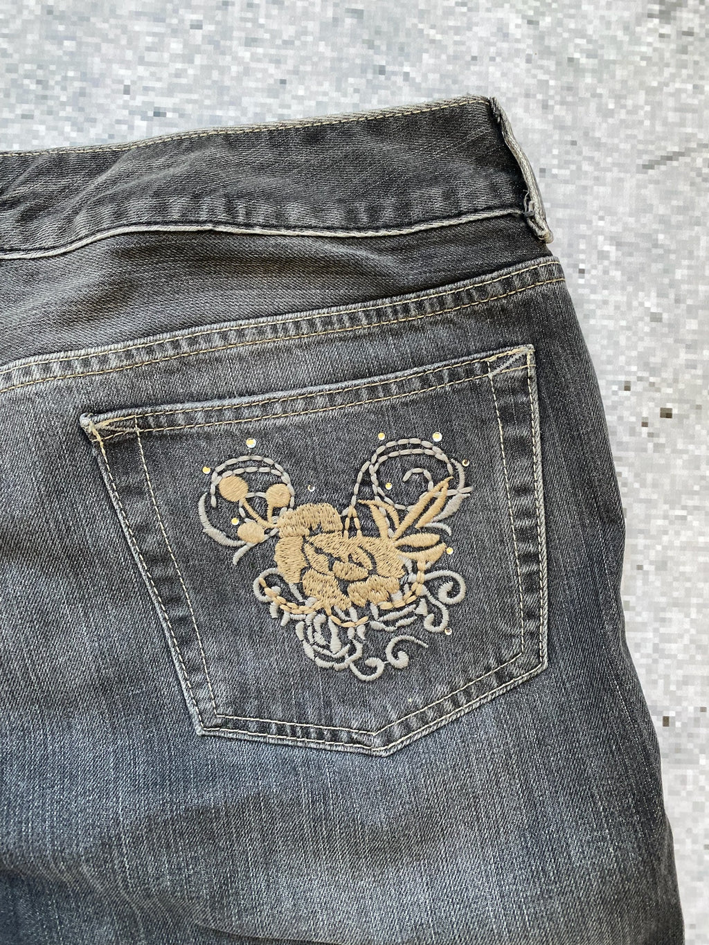 Flared and Low Waisted Jeans with flower pocket detail