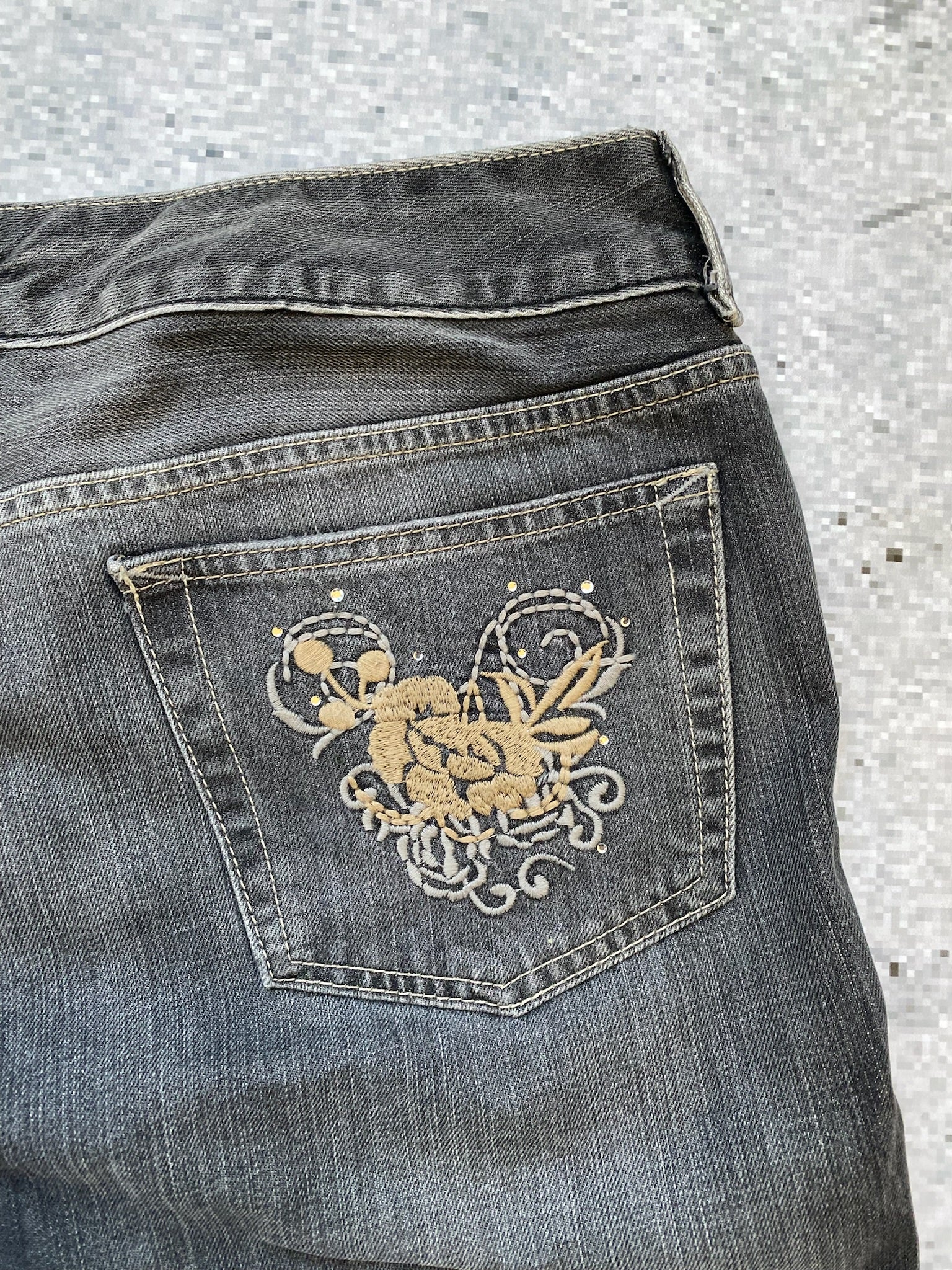Flared and Low Waisted Jeans with flower pocket detail